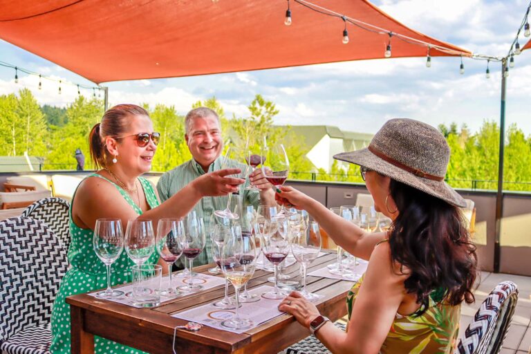 friends drinking wine on patio